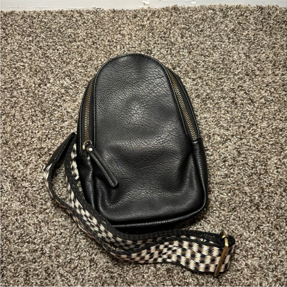 Anthropologie Black faux Leather sling Bag with fabric Checkered Strap